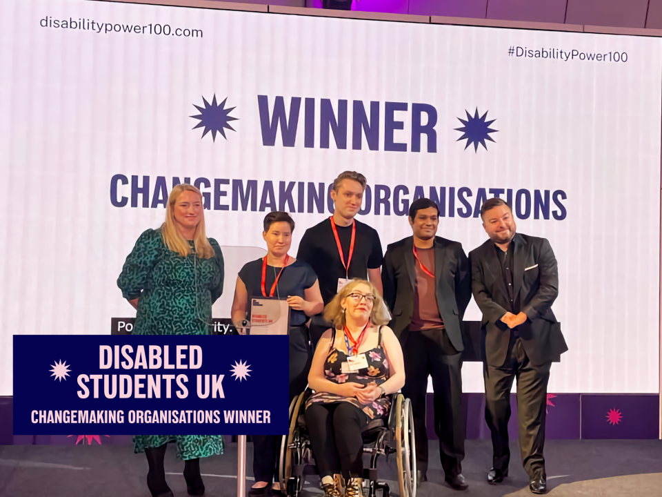 Photo showing the Disabled Students UK team holding their award certificate alongside the Disability Power 100 awards presenter and presenter of the award.